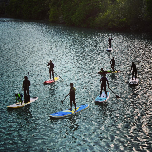  Do Stand Up Paddle in a group 