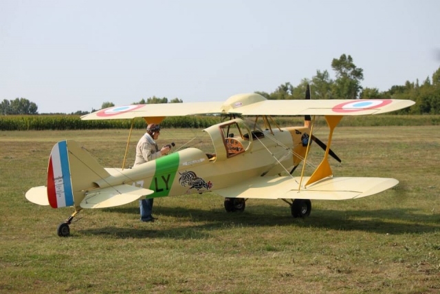  Airplane on grass runway 