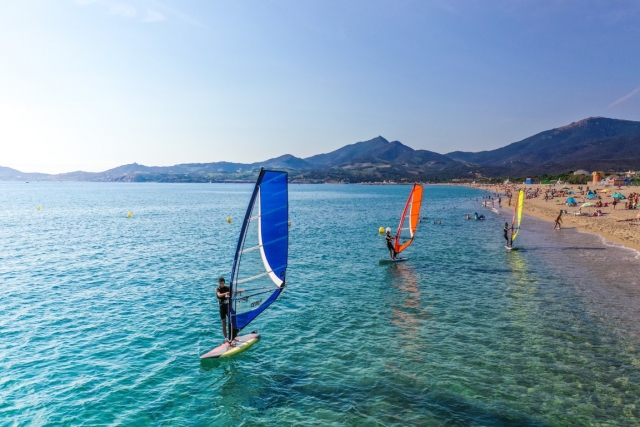  Windsurfing by the beach 