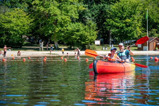 A two-seater canoe on the pond 