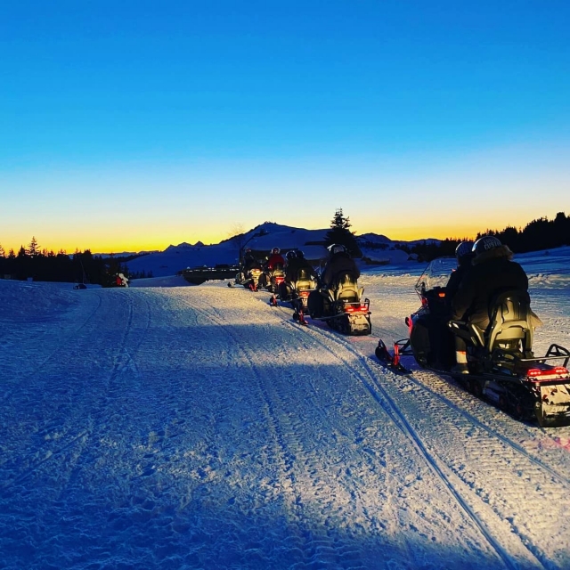  Snowmobile ride at nightfall