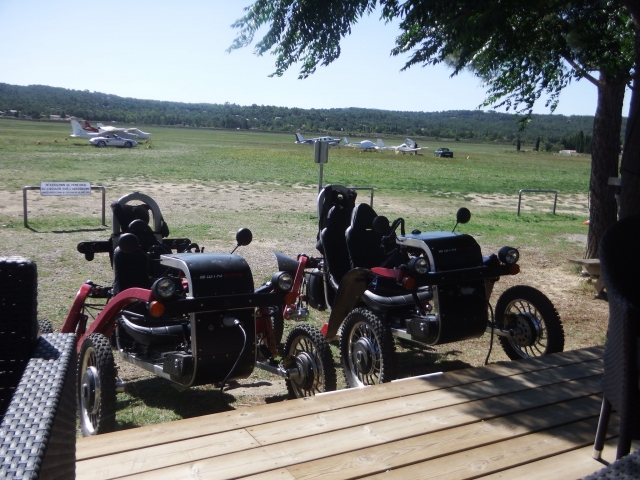 Two-seater swincar models parked 