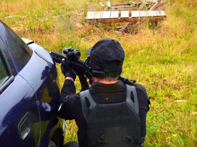  Shoots behind a car wreck on our battlefield
