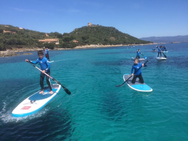  Children on their paddle surf 