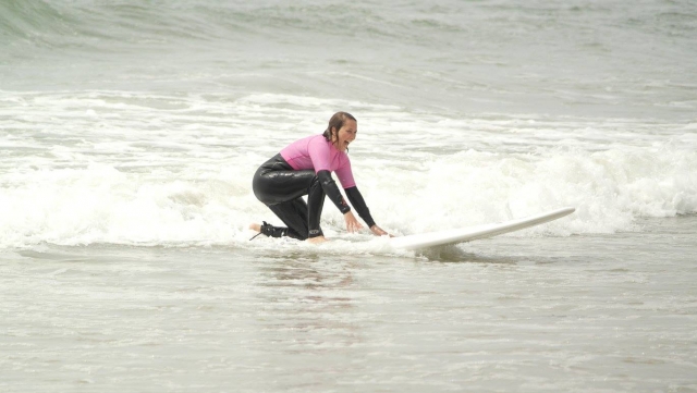 Learn to surf with an instructor 