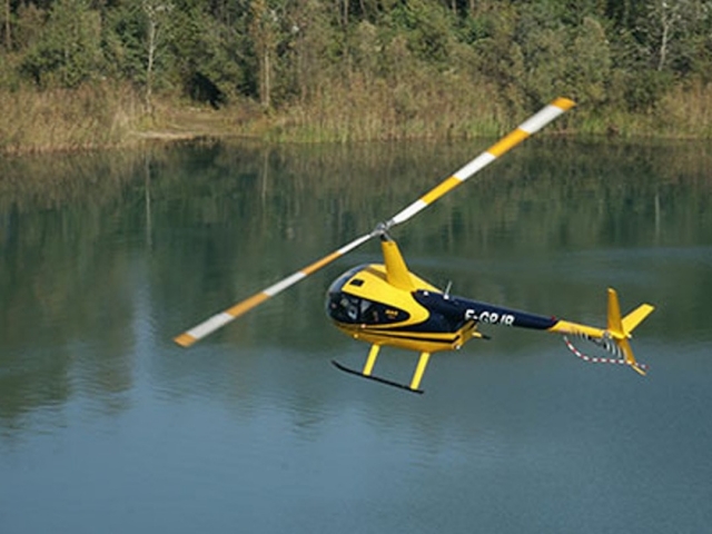 Flight over a lake in the Beaujolais region 