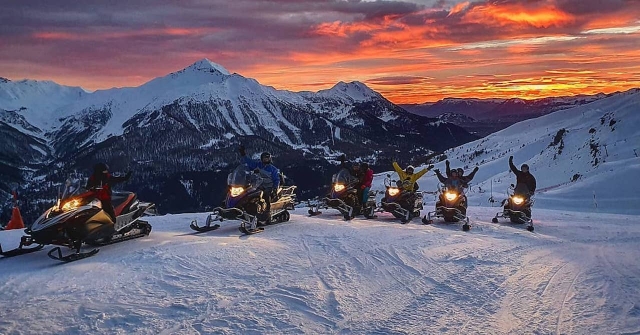  Snowmobile ride at sunset 