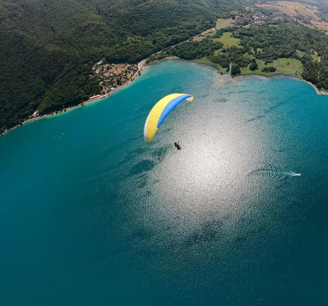 Above the turquoise waters of the lake 