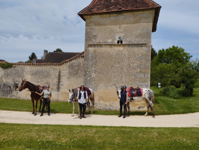  In front of a tower of a Dordogne castle 